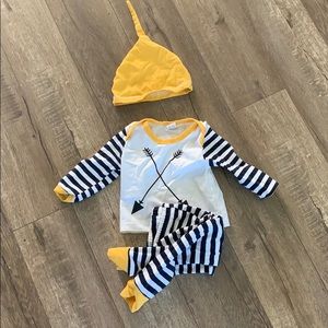 Adorable bright summer outfit with arrow pattern.